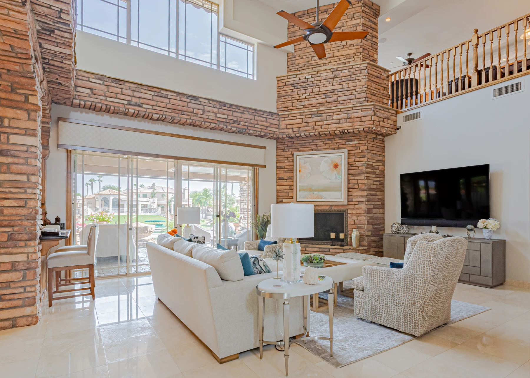 Luxury Phoenix great room with stone fireplace